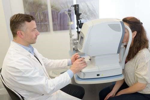 a person getting an OCT scan