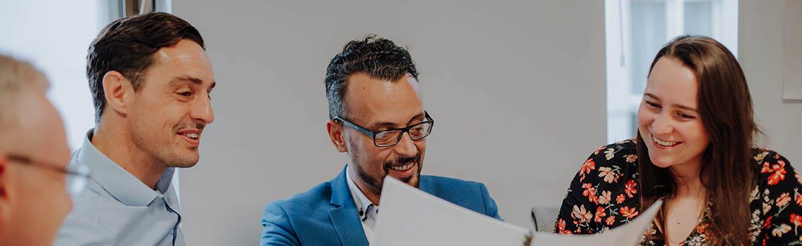 People looking at a document