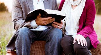 Couple reading a book