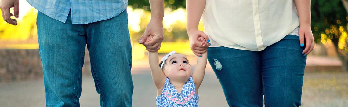 Baby holding hands