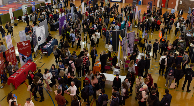 Ariel image of higher education fair with people and exhibiton