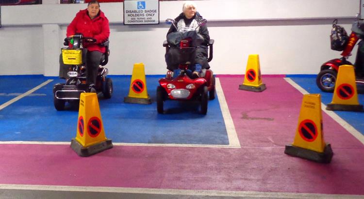 Ladies on mobility scooters