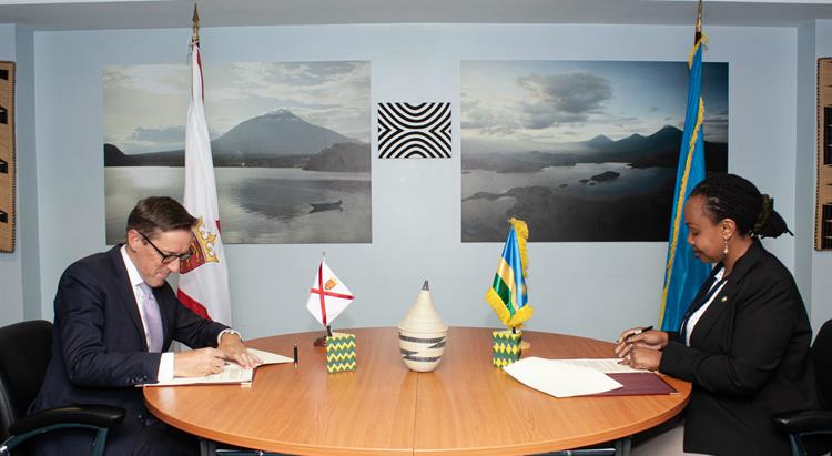 Senator Ian Gorst and Her Excellency Yamina Karitanyi