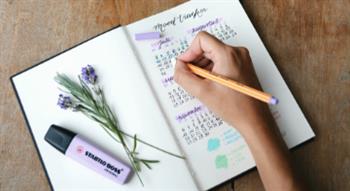 Woman writing in diary