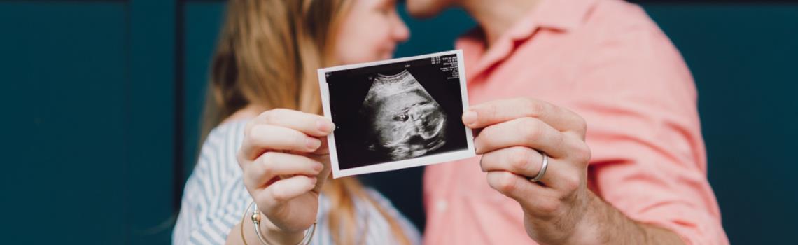 Couple with baby scan