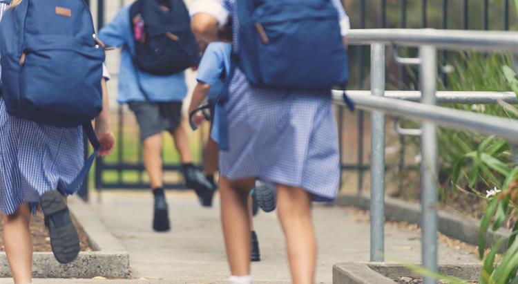 Pupils running in playground