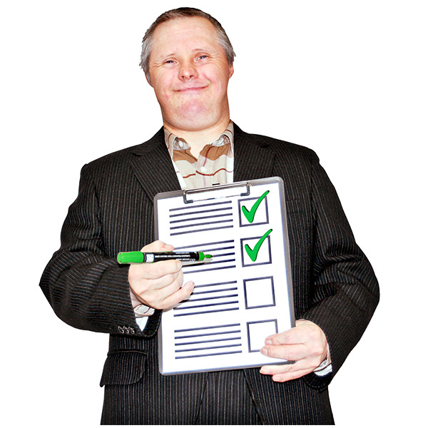 Man holding a form with green ticks on it