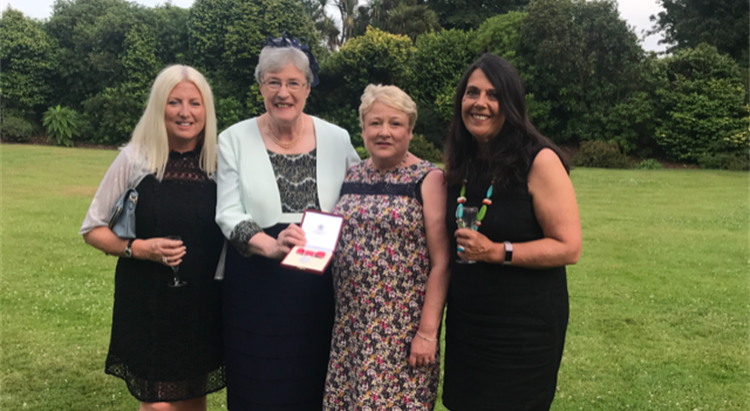 Patricia Holland with her award