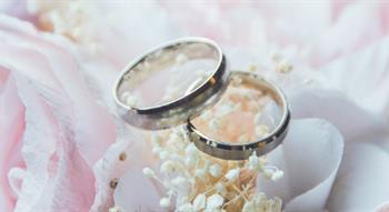 Wedding rings on flowers