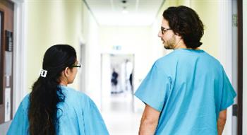 Two nurses talking