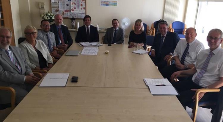 Charlie Massey chief executive of the GMC with senior management staff from HCS