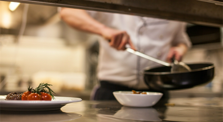 Kitchen chef preparing dishes