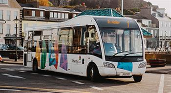 Photo of Liberty bus outside Gorey castle and houses