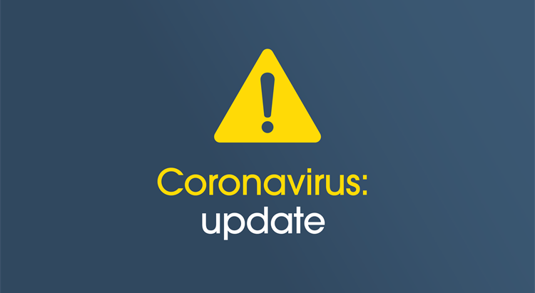 Attention sign with the wording Coronavirus Update