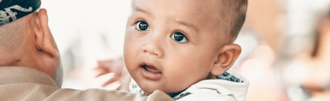 Man holding baby